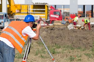 Man performing an ALTA survey