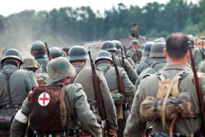 Squad of soldiers on historical reconstruction of the Second World War.